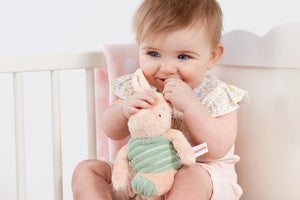 The beautiful Piglet 20cm soft toy makes the perfect first companion for baby. Based on the character featured in A.A Milne's heart-warming Tales from the Hundred Acre Wood storybooks this classically-styled cuddly toy is made from the highest quality, textured plush fabric with beautifully embroidered features.  The lovable Piglet soft toy is perfect for baby to snuggle up with and makes a great newborn gift.