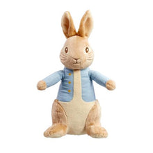 Load image into Gallery viewer, this adorable Peter Rabbit soft toy from milkandblack to ready to head out on adventures but he&#39;s also super soft, and loves a big squeezy cuddle! Beatrix Potter&#39;s Peter Rabbit, is one of the most-loved children&#39;s characters, and this 24cm lovable bunny, with his famous blue jacket and big floppy ears, makes a wonderful playtime friend as well as super soft and cuddly night time companion.  This special cuddly friend, that is suitable from birth, will be by your little one&#39;s side throughout their childhood.