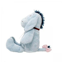 Load image into Gallery viewer, The lovable Eeyore 20cm soft toy makes the perfect first companion for baby. Based on the character featured in A.A Milne&#39;s heart-warming Tales from the Hundred Acre Wood storybooks this classically-styled cuddly toy is made from the highest quality, textured plush fabric with beautifully embroidered features.  The adorable Eeyore soft toy is perfect for baby to snuggle up with and makes a great newborn gift.